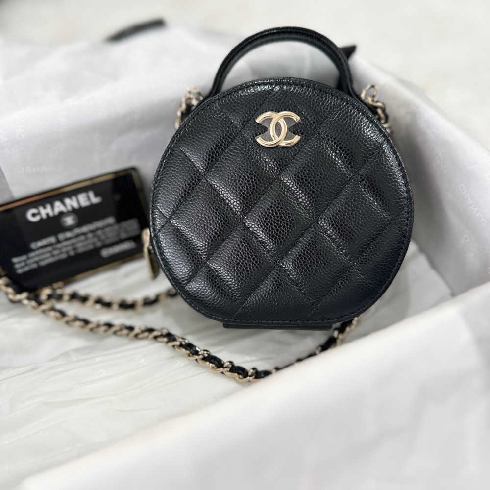 CHANEL Black Quilted Round Mini Bag with Gold CC